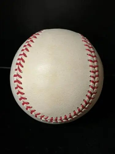 White baseball with red stitching featuring Edd Roush autograph for Cincinnati Reds collector