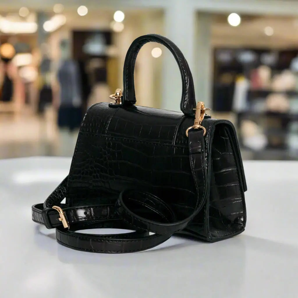 Egon Von Furstenberg black croc embossed synthetic leather handbag with top handle and shoulder strap