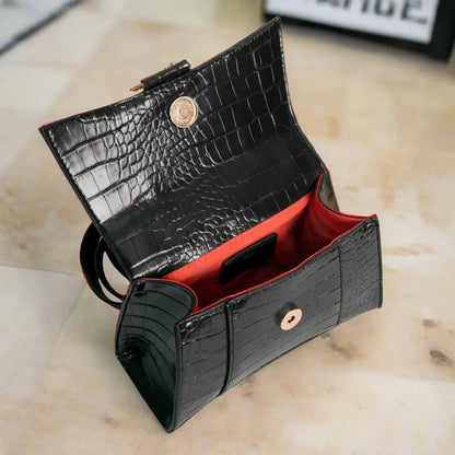Open black croc embossed synthetic leather handbag with red interior lining by Egon Von
