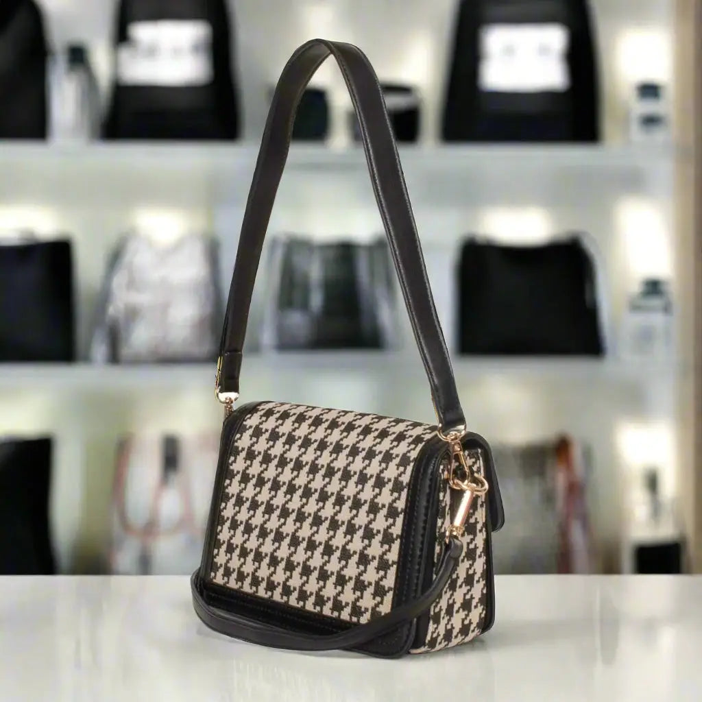 Egon Von Furstenberg black synthetic print handbag with houndstooth pattern and shoulder strap