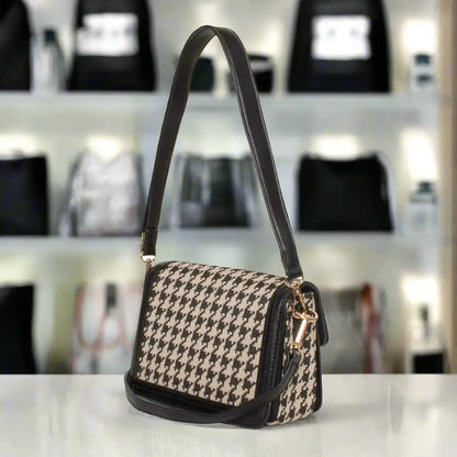 Egon Von Furstenberg black synthetic print handbag with houndstooth pattern and shoulder strap