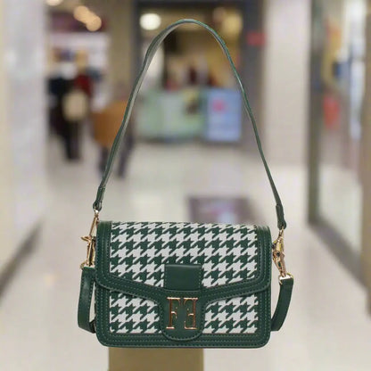 Green and white houndstooth shoulder bag with gold clasp and shoulder strap from Egon Von Furstenberg