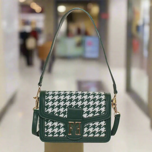 Green and white houndstooth shoulder bag with gold clasp and shoulder strap from Egon Von Furstenberg