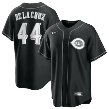 Black Cincinnati Reds baseball jersey featuring Elly De La Cruz Nike Lights Out Replica design