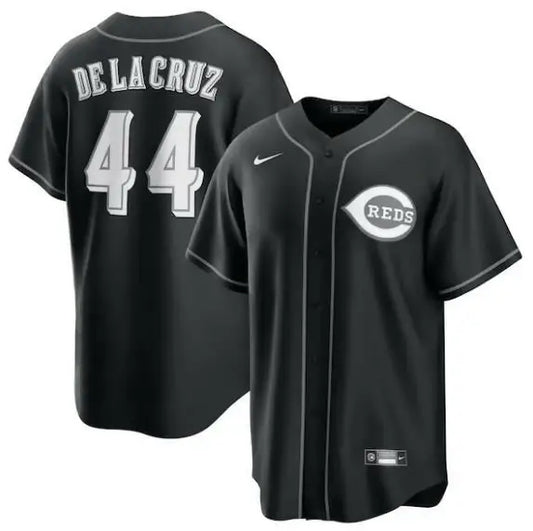 Black Cincinnati Reds baseball jersey featuring Elly De La Cruz Nike Lights Out Replica design