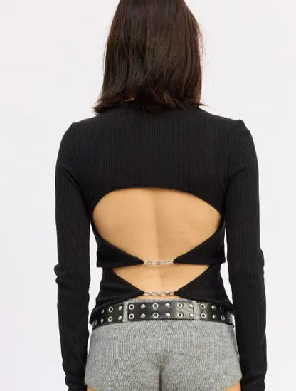 Black ribbed long-sleeve top with open back and chain details from Emory Park