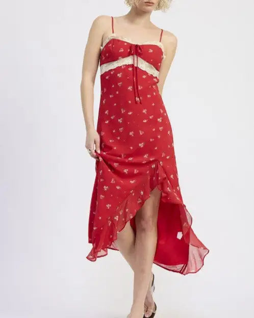 Red floral midi dress with lace trim and ruffled high-low hem by Emory Park