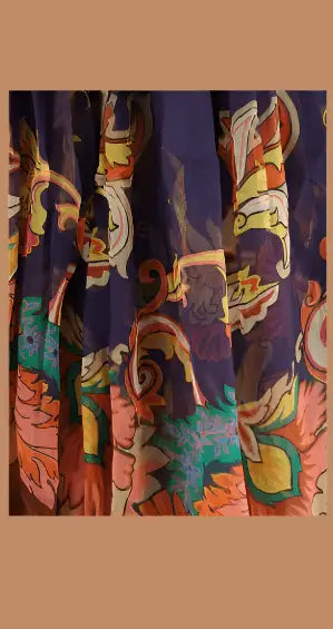 Flowing sheer fabric with vibrant floral and paisley pattern on ETRO SILK LONG DRESS
