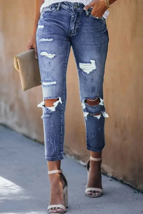 Women’s fading distressed holes crop jeans with distressed holes and high heels