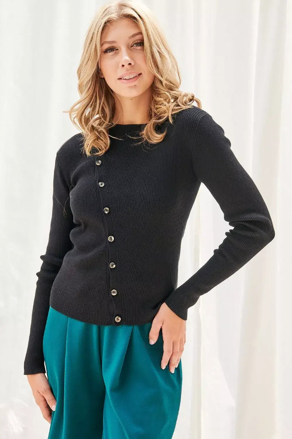 Black long sleeve knit button-up cardigan with ribbed cuffs and hem from Faith Apparel