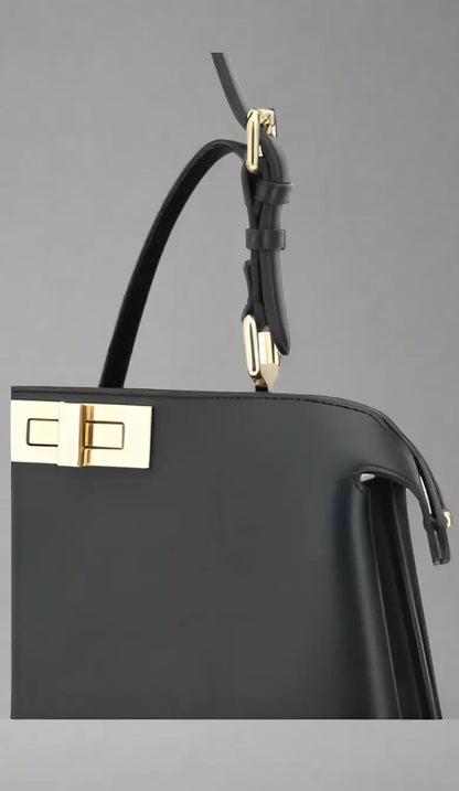 Black leather Fendi Peekaboo handbag with gold-tone hardware showcasing luxury style