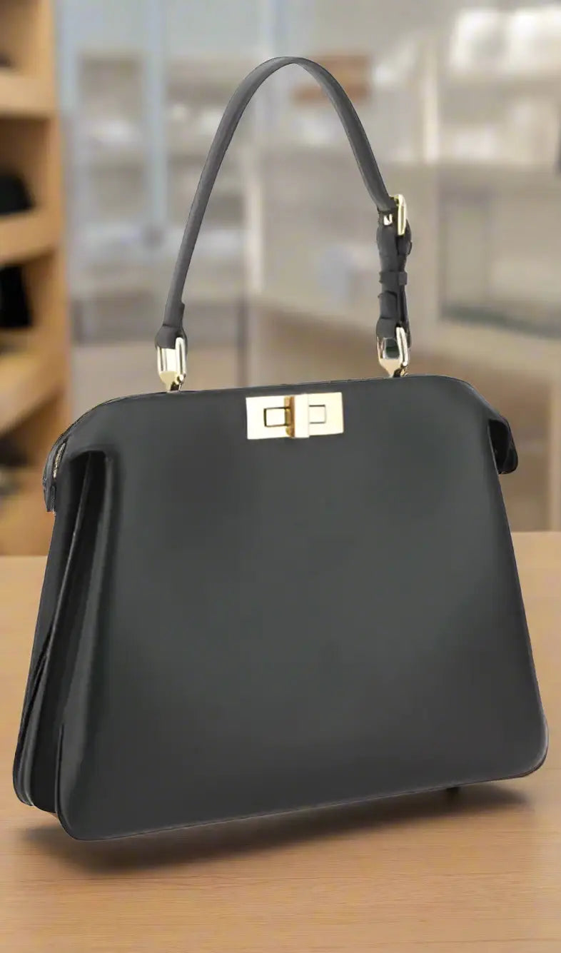 Fendi Peekaboo handbag in black leather with top handle and gold turn-lock closure