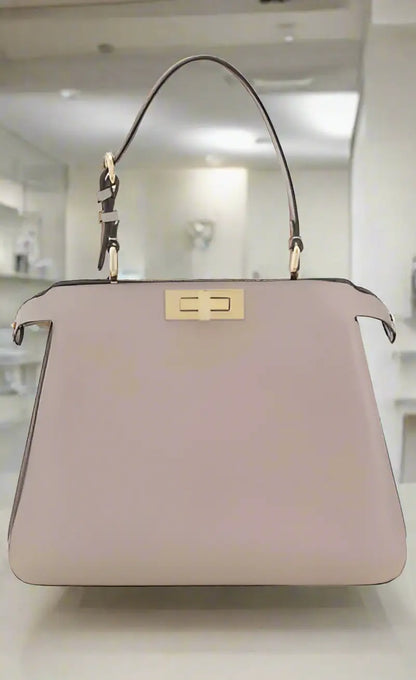 Light pink leather Fendi Peekaboo handbag with top handle and gold-tone hardware