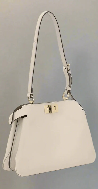 Cream-colored leather shoulder bag with gold-tone clasp from FENDI PEEKABOO LEATHER HANDBAG