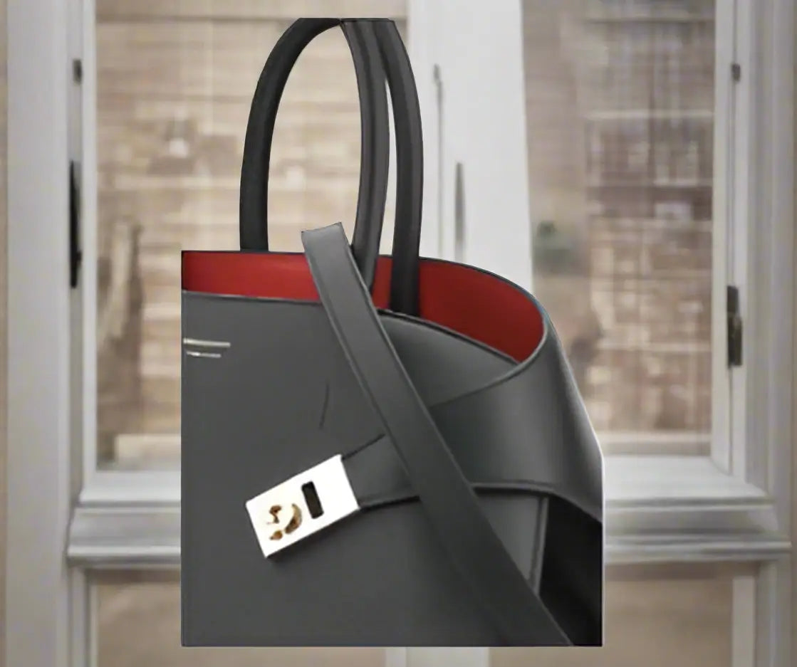 Ferragamo black red hug handbag with black leather, red interior, and gold hardware