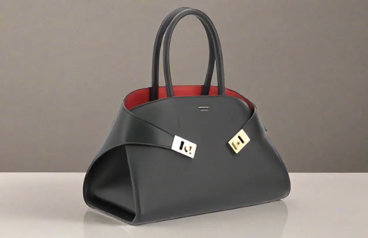 Ferragamo black red hug handbag with sleek black leather and gold hardware