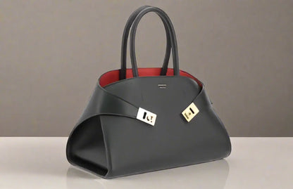 Ferragamo black red hug handbag with sleek black leather and gold hardware