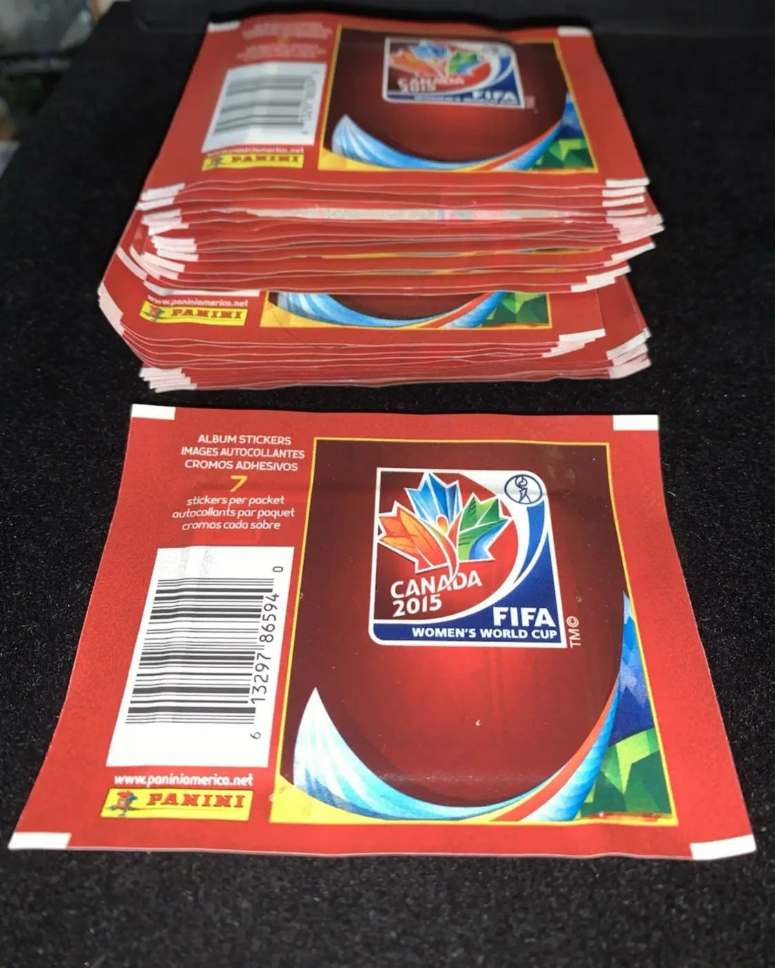 Stack of unopened FIFA World Cup SOCCER 2015 Canada Women’s World Cup sticker packs