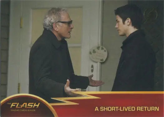Two men converse, older with gray hair and glasses, featured on Flash Season 1 Gold Logo Parallel Chase Card