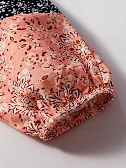 Close-up of pink floral patchwork blouse sleeve with elastic cuff for Floral Patchwork Top