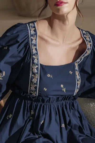 Dark blue floral square neck dress with balloon sleeves and delicate embroidery