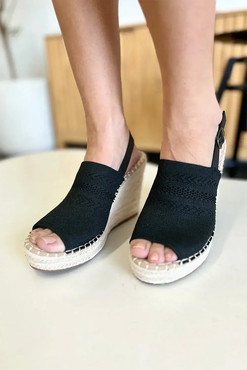 Black woven espadrille wedge sandal with ankle strap, peep toe high heel footwear
