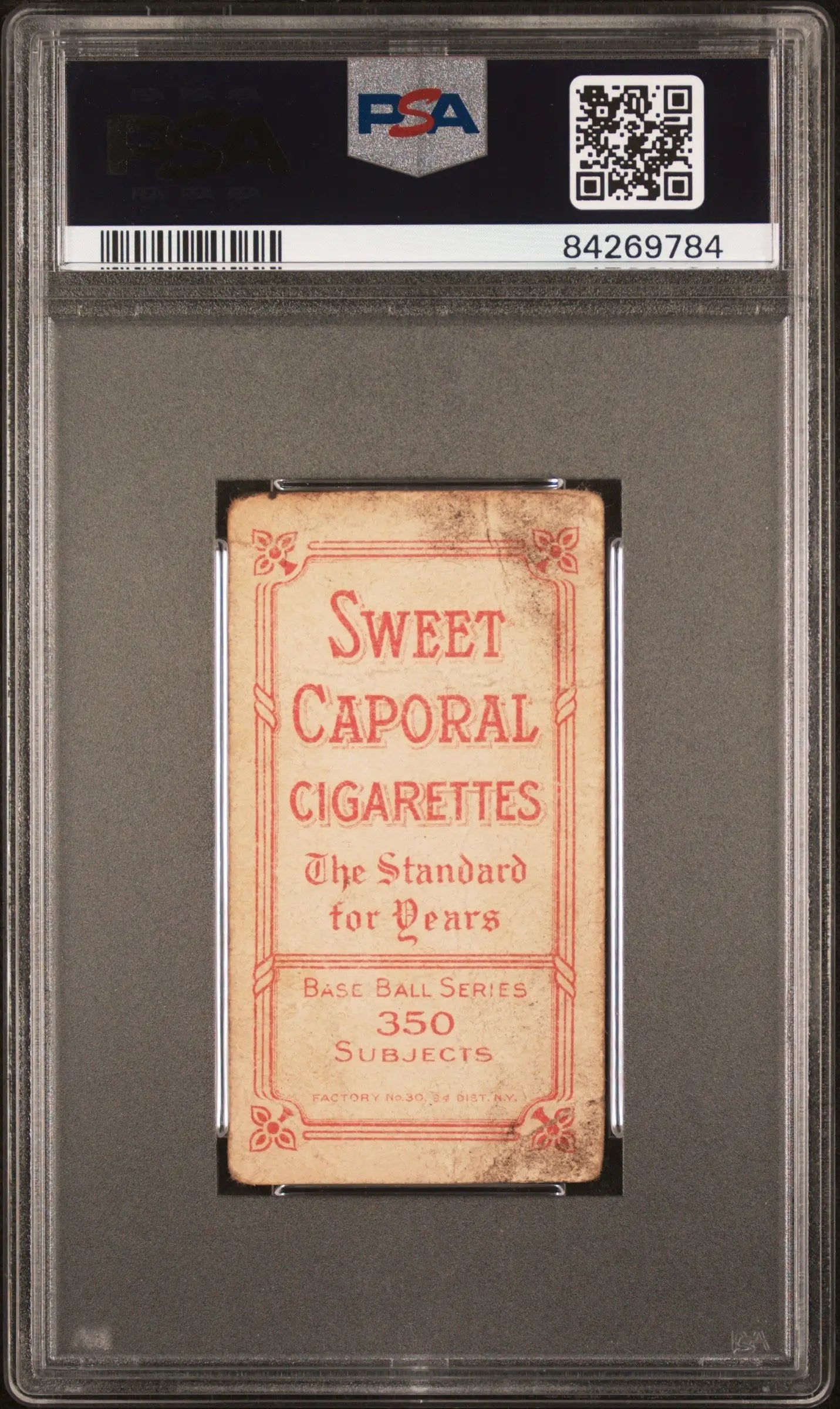 Vintage Sweet Caporal cigarette pack featuring pink-tinted text in T206 Sweet Caporal design
