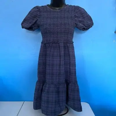 Blue plaid smocked midi dress with puffed sleeves from Free Assembly Girls Plaid Dress collection
