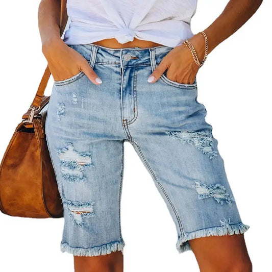 Light-wash ripped denim bermuda shorts with frayed hems and high elasticity for a perfect fit