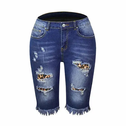 Dark blue distressed denim capri shorts with leopard patches, high elasticity, ripped holes