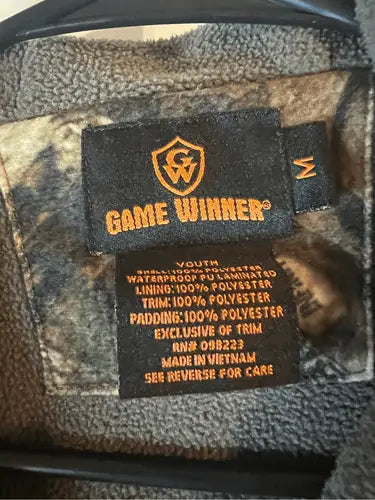 Game Winner Youth Camouflage Jacket with polyester shell lining trim and padding