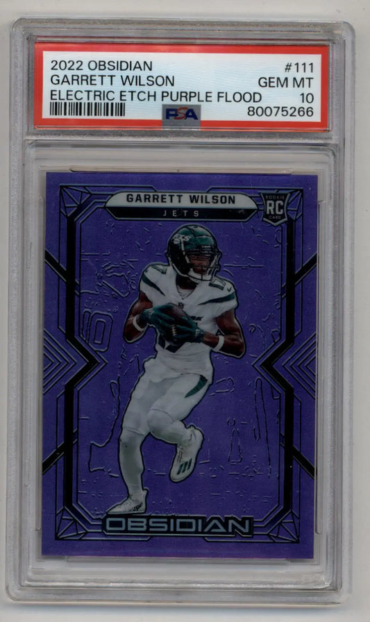 PSA-graded Garrett Wilson 2022 Obsidian Electric Etch Purple Flood football card in case