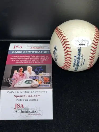 Autographed baseball by Gene Stallings certified with JSA for collectors and trading cards