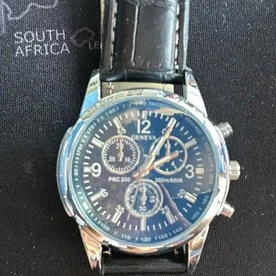 Geneva Men’s Quartz Watch with black leather strap and dark blue dial