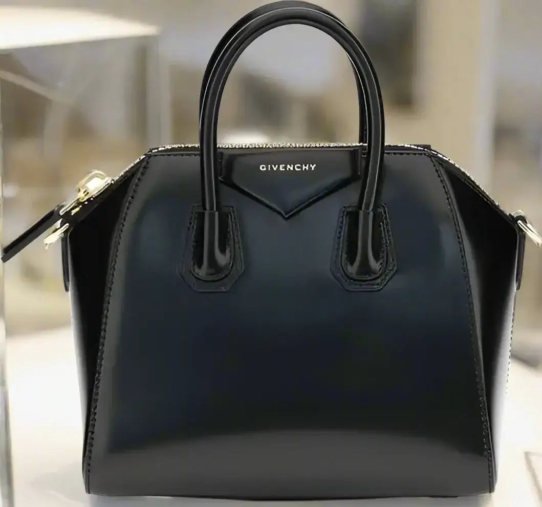 Black leather Givenchy Antigona mini handbag with top handles and zipper closure