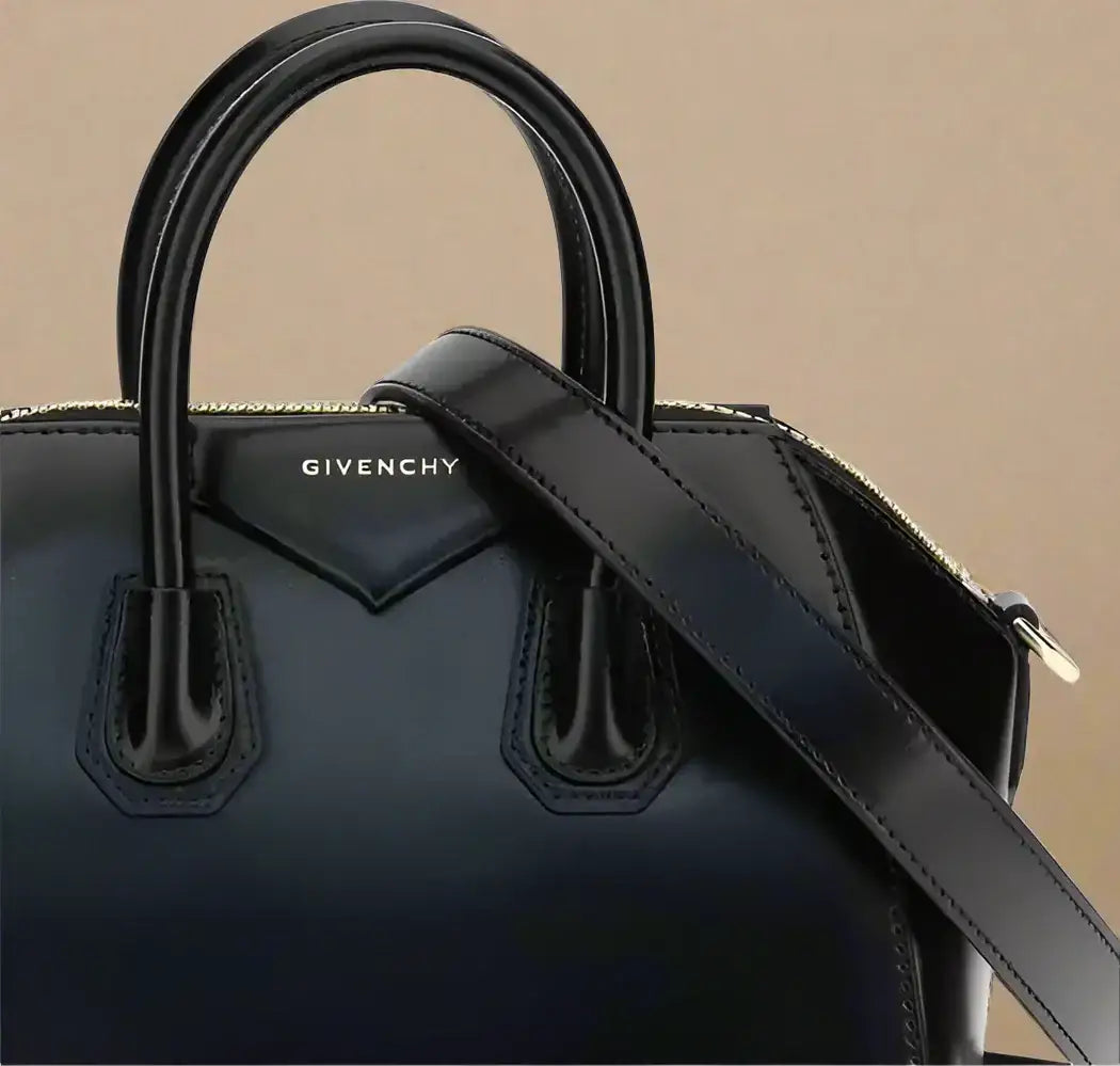 Black leather Givenchy Antigona mini handbag with top handles and shoulder strap