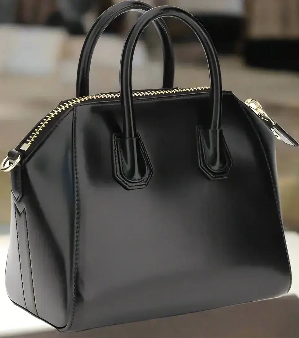 GIVENCHY Antigona mini handbag in black patent leather with gold zipper and top handles