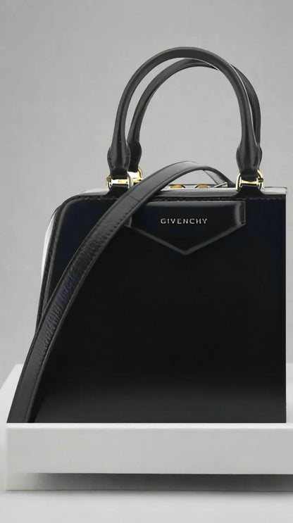 Black leather Givenchy Antigona Cube Mini Handbag with top handles and shoulder strap