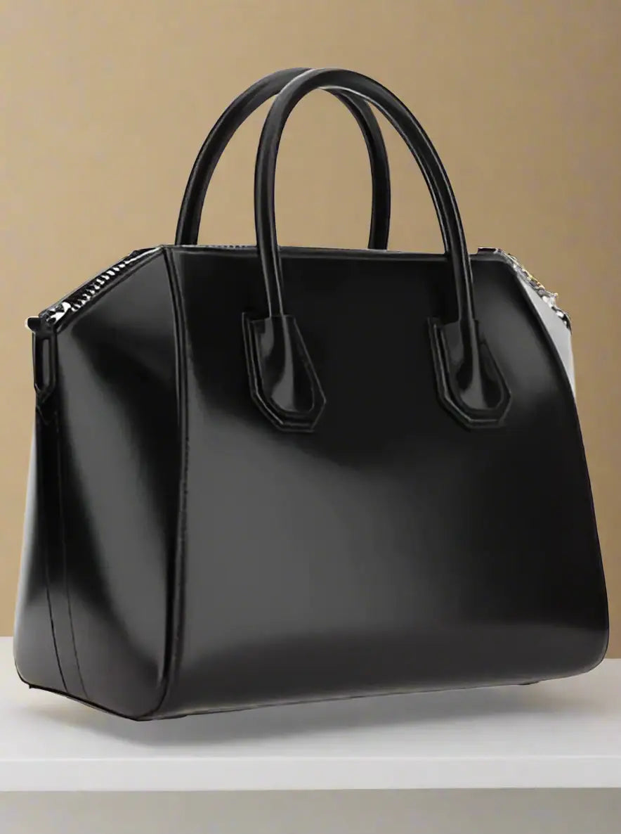 Shiny black leather Givenchy Antigona handbag with top handles and zipper closure