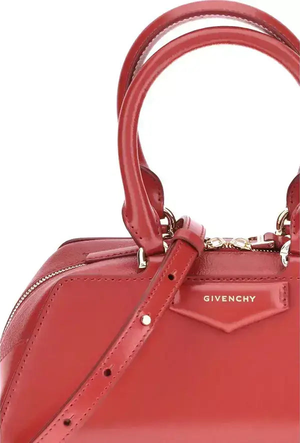 Red Givenchy Antigona East West mini handbag with top handles and shoulder strap