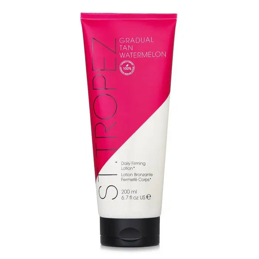Pink and white tube of gradual tan Watermelon Daily Firming Lotion with black flip-top cap