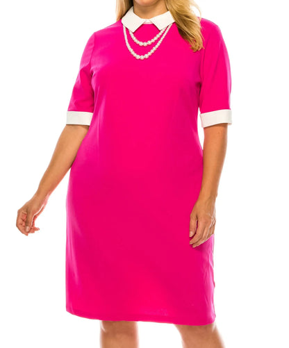 Plus-size hot pink sheath dress with white collar cuffs and double-strand pearls