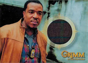 Man in a tan leather jacket and colorful shirt for Russell Hornby as Hank Griffin trading card