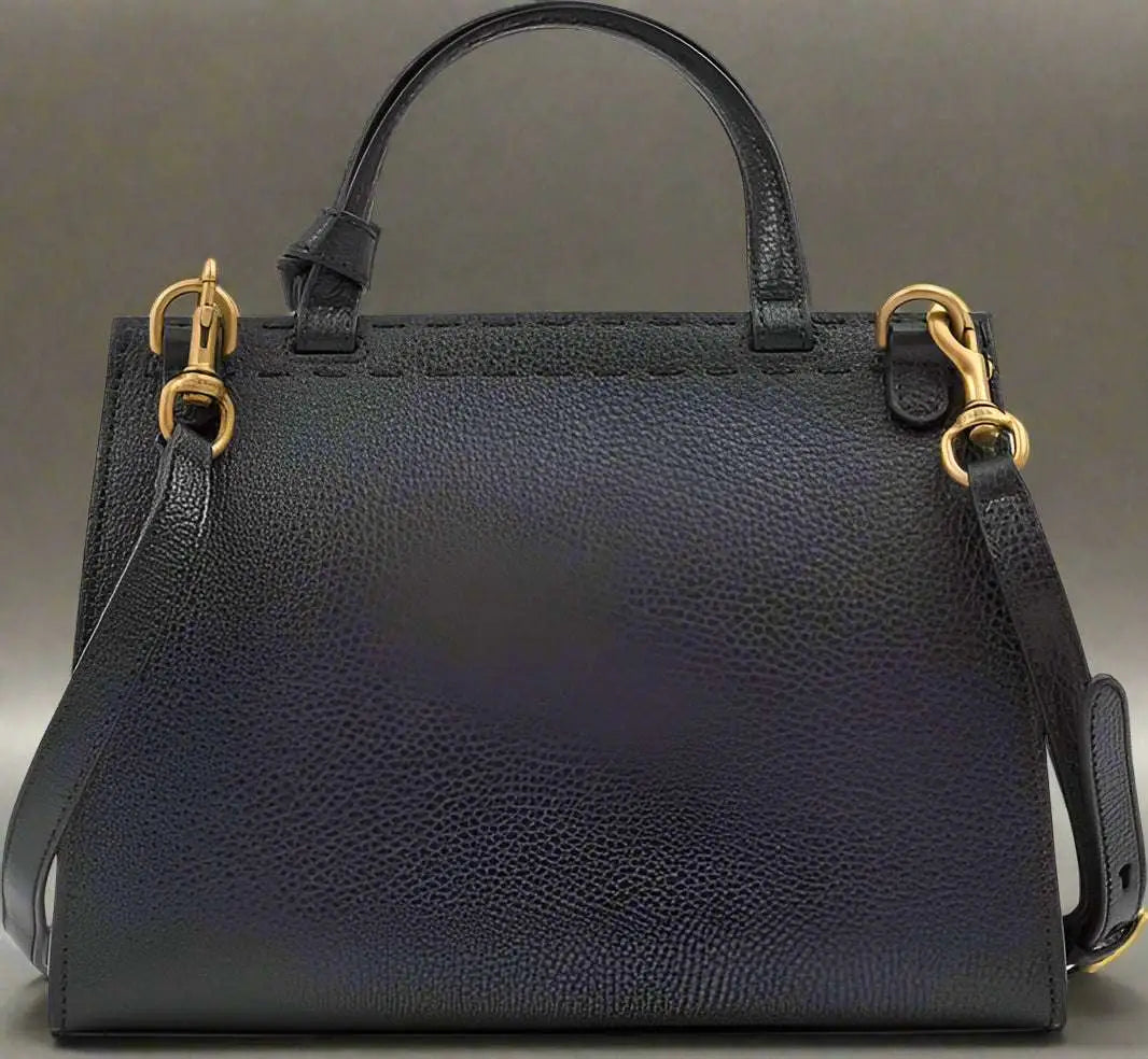 Black leather GG Marmont handbag with gold-tone hardware and detachable shoulder strap