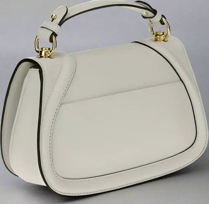 Gucci Blondie Handbag with tonal leather, top handle, and gold-tone hardware