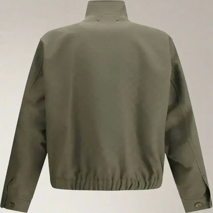 Olive green GUCCI GG Supreme men’s Monogram jacket with high collar fastened and elasticized hem