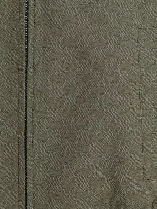 Olive green Gucci GG Supreme men’s Monogram Jacket with zippered high collar fastened