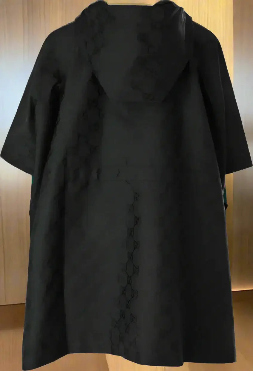 Black hooded poncho with short sleeves from GUCCI GG jacquard nylon coat, unisex style