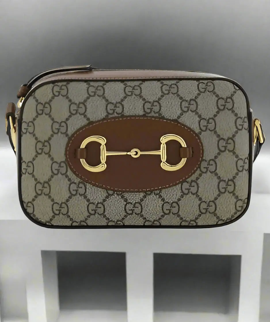 Gucci Horsebit 1955 shoulder bag in GG Supreme canvas with brown leather trim