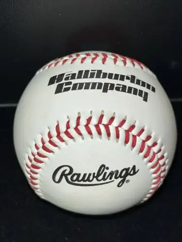White baseball with red stitching from Halliburton Company Rawlings Astros edition